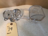 Clear glass dog pulling a cart