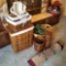 Assortment Decorative Wicker Baskets and Rug