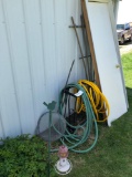 Exterior Door and Frame, Tellis, and Variety of Water Hose, Reels