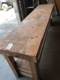 2' x 8' x 32' H wood work bench. No shipping