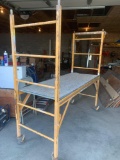 6' long x 6' tall working scaffold on wheels with brakes, wooden tray. No shipping