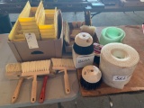Yellow plastic organizers, various sizes and kinds of brushes, sill sealer. No shipping