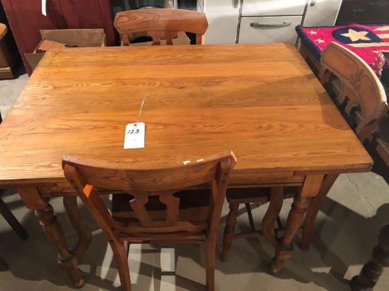 45'' W x 32'' L solid wood table w/9'' end extensions and (3) solid wood chairs. No Shipping!