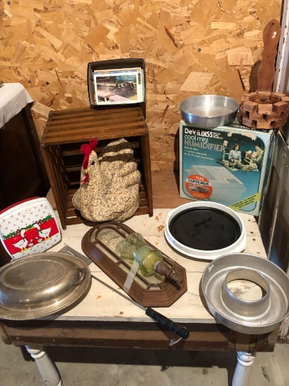 Wooden egg crate, humidifier, various tin and silver-lidded casserole