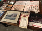 (2) 1952 Granville calendars, 1990 Budweiser calendar, various woodworking books, doll collection