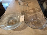 Water pitcher and (2) large decorative glass bowls.