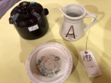 Archer, IA crock pitcher, West Bend, IA brown bean pot, & more.