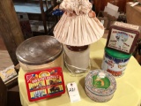 Brown-top jug w/electric lamp and shade, vented bread/flour tin, and other tins.