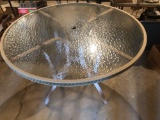 48'' Round glass-top patio table.