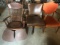 9-spoke, pressed back antique wood rocker (seat needs repair), swivel leather office chair, and