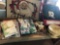 Various Christmas decor, Christmas tablecloths, entrance rug, and 24'' pre-lit wreath.