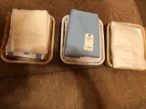 (3) Boxes of fancy tableclothes and more!