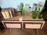 Old enamel stove-top w/2 doors (37'' W x 30'' H), including bottles and books - No Shipping!