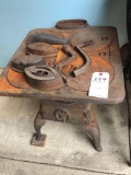 Cast iron 4-place stove w/handles, and (3) sad irons - No Shipping!
