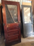 Antique wood door w/glass insert (32'' W x 6' 7''), and (1) stained brown antique door (32'' x 6'