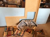 Corner countertop w/stainless steel sink (61'' x 57''), several boxes of various hardback books.