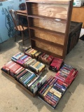 5-shelf wood bookshelf (36'' W x 6'' D x 45.5'' H), several boxes of romance books, and more.