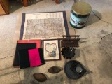 Osceola Co. map, tin, napkin holder, sad iron, and enamel pie plate.