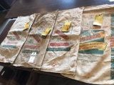 Various DeKalb cloth seed corn bags w/original tags.