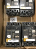 4 used 15 AMP Mitsubishi breakers