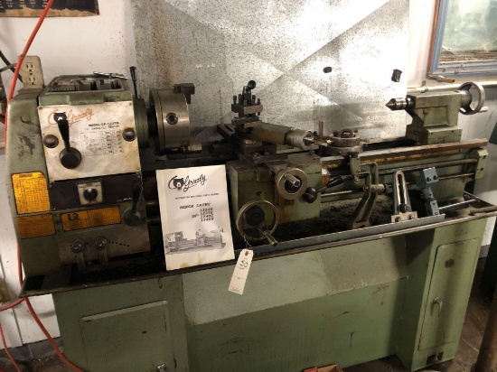 Grizzly 12'' x 37'' metal lathe, model DF-1237G, has 3 & 4 jaw chucks & faceplate - includes taper