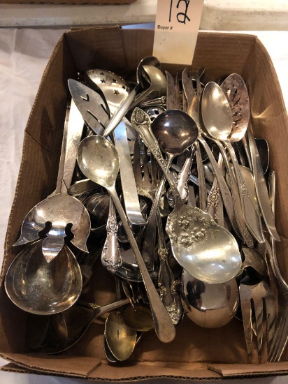 Flat of plated flatware.