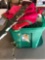 Tote of Christmas decor and Christmas tree blanket.