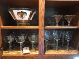 Assortment of various size stemmed glasses and glass punch bowl. NO SHIPPING!