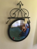 22 inch round wall mirror with decorative iron top. NO SHIPPING!