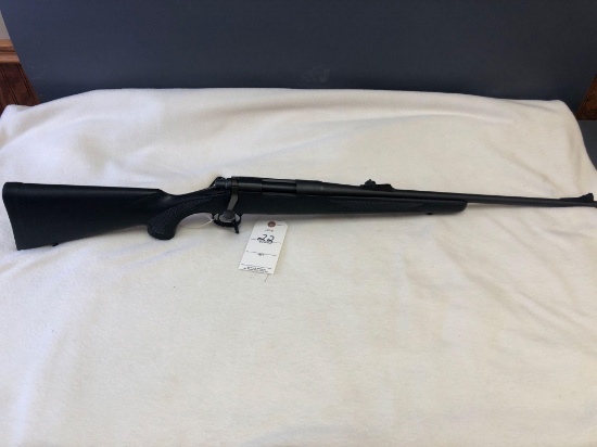 Used - Remington Mod. 700 243WIN bolt action rifle. SN: E6802858, black stock w/very minor handling