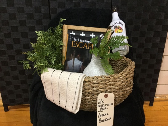 Basket of goodies: Hacienda bowl basket filled with Fiction Book authored by Brenda Bunkers, cotton