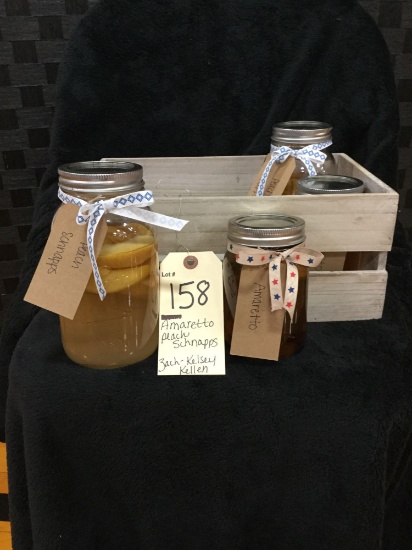 Basket with homemade amaretto & peach schnapps (Donated by: Zach & Kelsey Kellen)