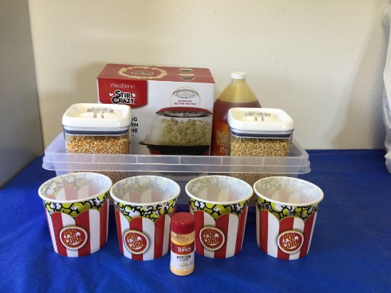 Popcorn machine with 2 containers of kernels, a jug of oil, salt and 4 popcorn containers (Al &