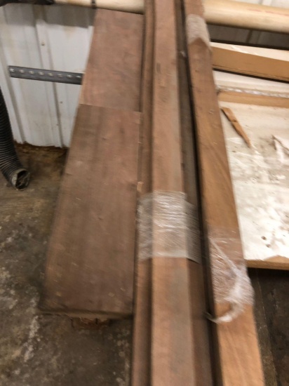 Several pieces of solid wood. No warranty on description regarding type of wood or amount