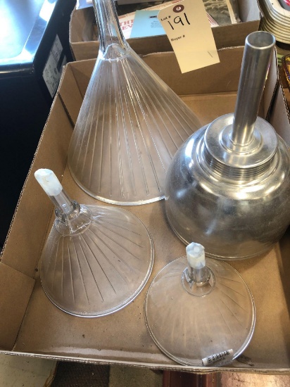 Stainless funnel, 8 ounce Air Vent glass funnel, 1/2 gallon ribbed glass funnel, 3rd glass funnel.