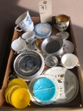 Misc. children dishes plastic and tin.
