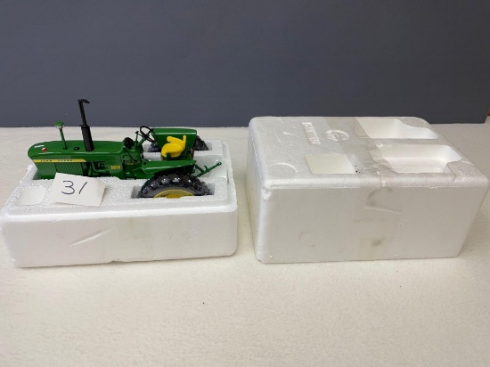 New in Styrofoam container - Die Cast 1/16th scale, Precision JD #3010 tractor.