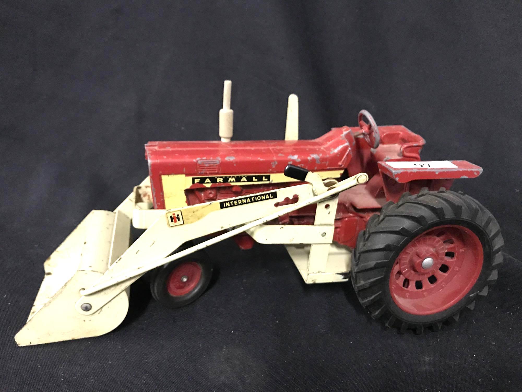 1/16 scale Ertl Farmall 806 Tractor w/Tru-Scale Proxibid
