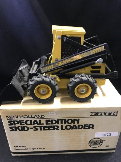 1/16 scale Ertl Special Edition New Holland Skid-Steer Loader w/Box
