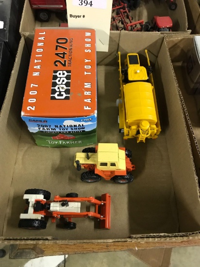 Assortment of 1/64 Scale Ertl Case Tractors and More