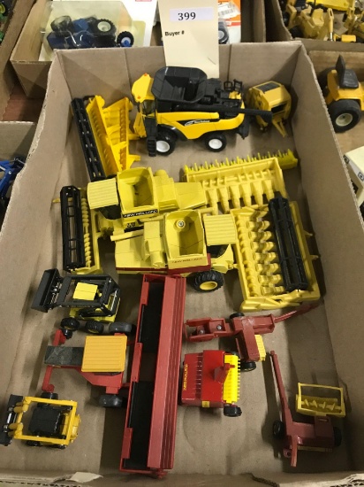 Assortment of 1/64 Scale Ertl New Holland Farm Machinery