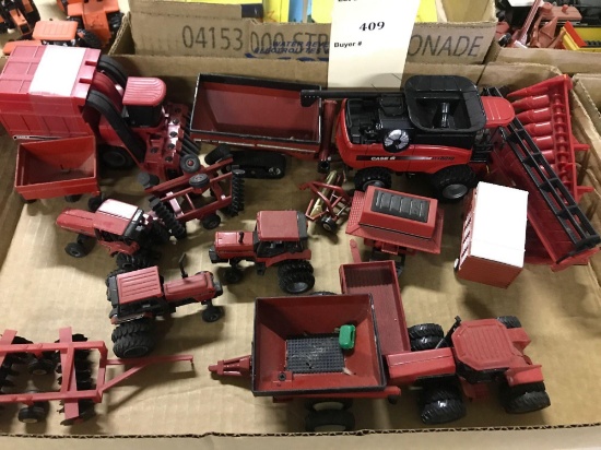 Assortment of 1/64 Scale Ertl C-IH Farm Machinery