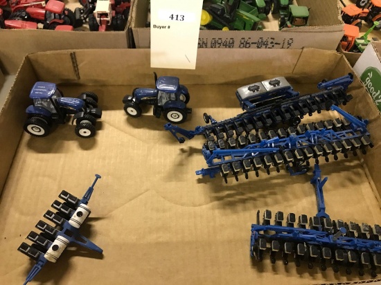 Assortment of 1/64 Scale Ertl New Holland and Kinze Farm Machinery