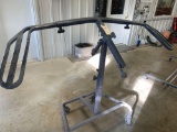 Adjustable bumper painting stand...on casters.