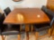 Square hightop curved edge table with center pedestal, four chairs. ( Really nice).