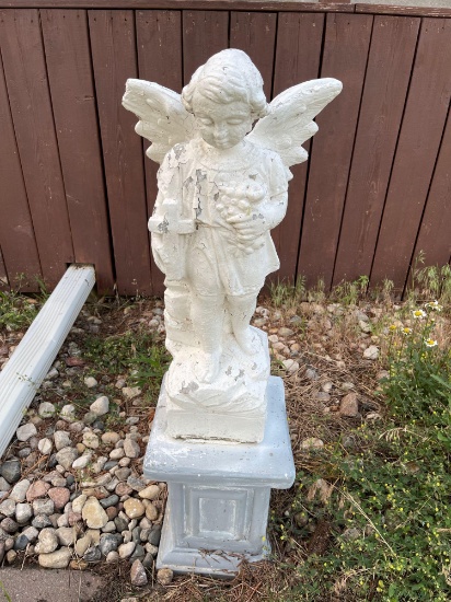 Cement outdoor angel statue with cross