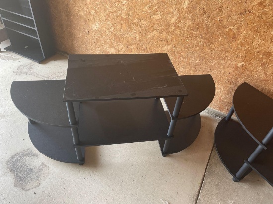 4 Black entertainment/display stands.
