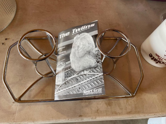 The Twins double beer can chicken holder, baking pan, tub floor mats, cookbooks, cookie cutters.