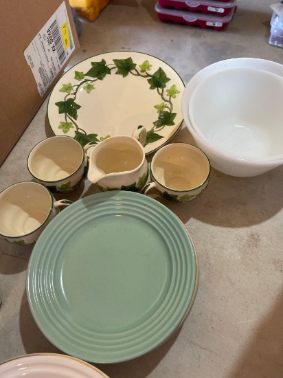 Tote full of all sizes of plates, bowls, cups, mixing bowls, pie plates, dinner plates etc.