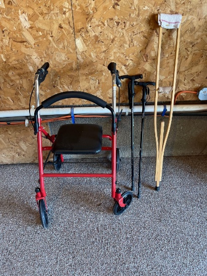 Drive 4 wheel stroller with seat and brakes, 2 canes.